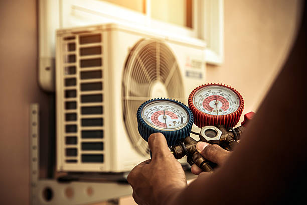 Professional Air Conditioning Service technician working in Calverton, NY